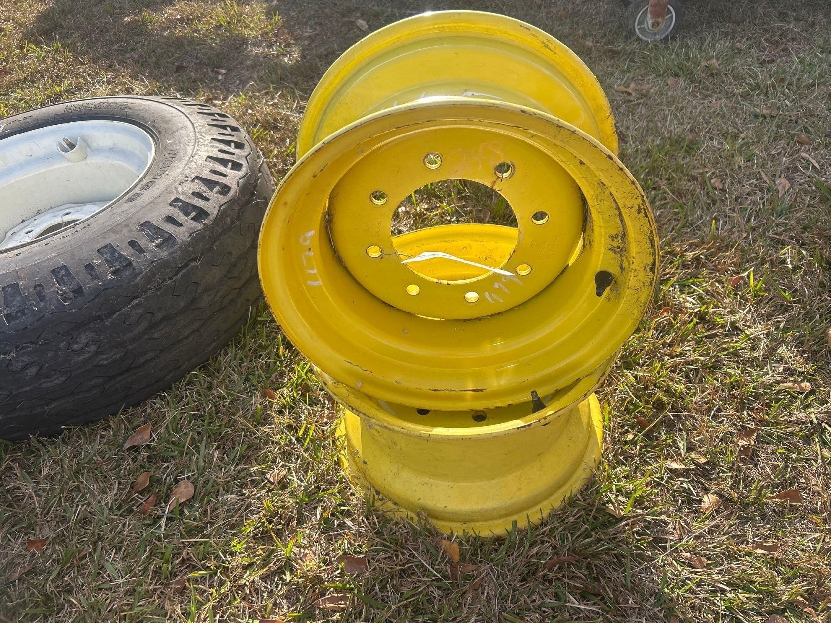 (2) JOHN DEERE 8 LUG RIMS