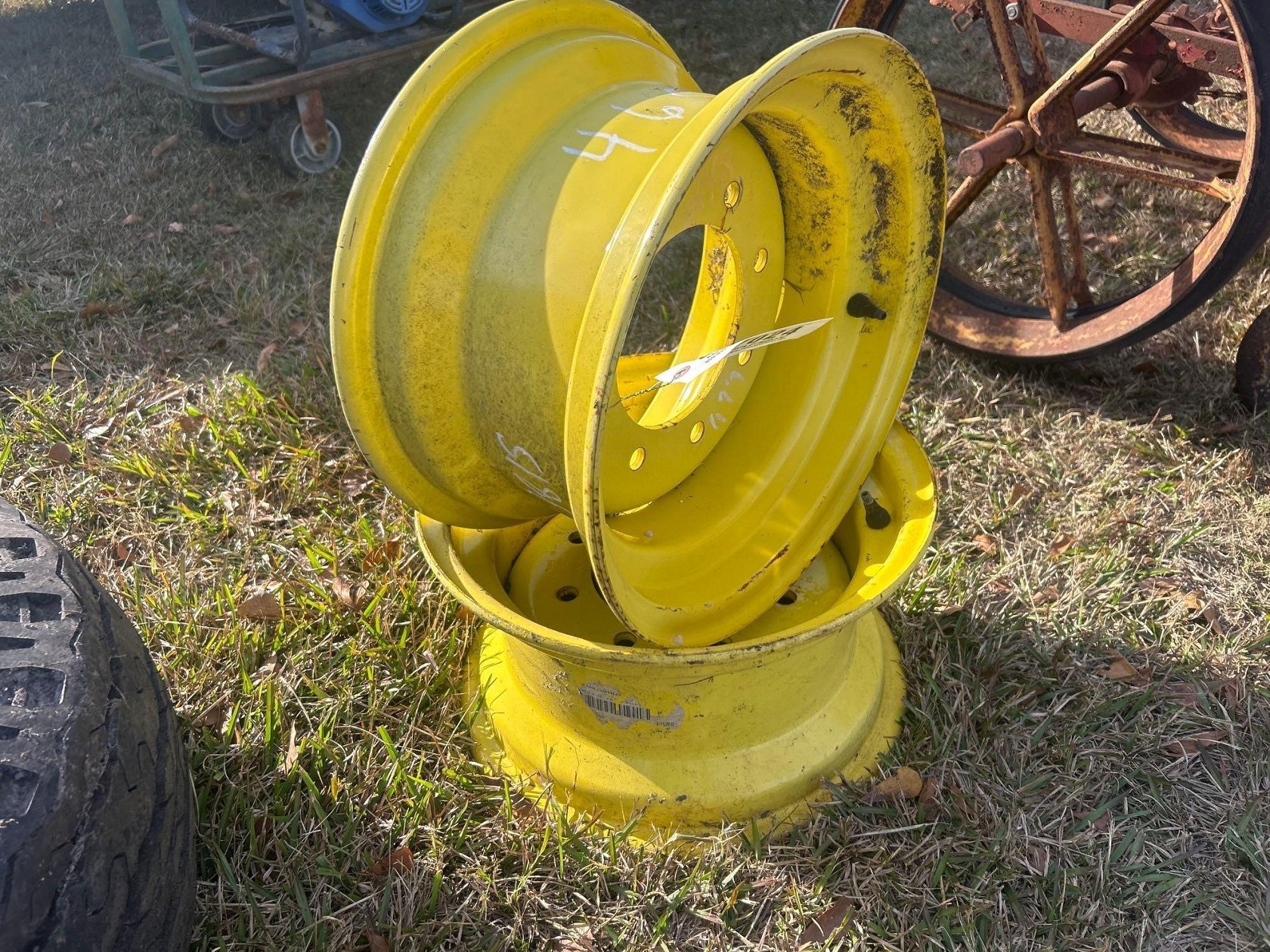 (2) JOHN DEERE 8 LUG RIMS